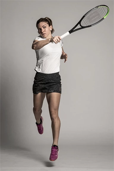Simona Halep avec des raquettes de tennis Wilson Blade v7